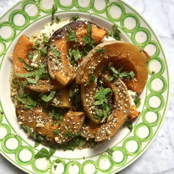 Roasted squash with hummus, dukkah and mint